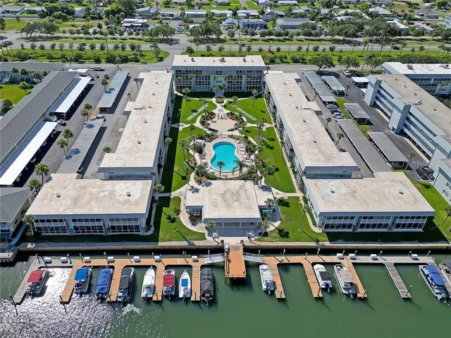 an aerial view of a chairs and table