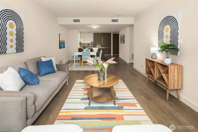 a view of living room with furniture and window