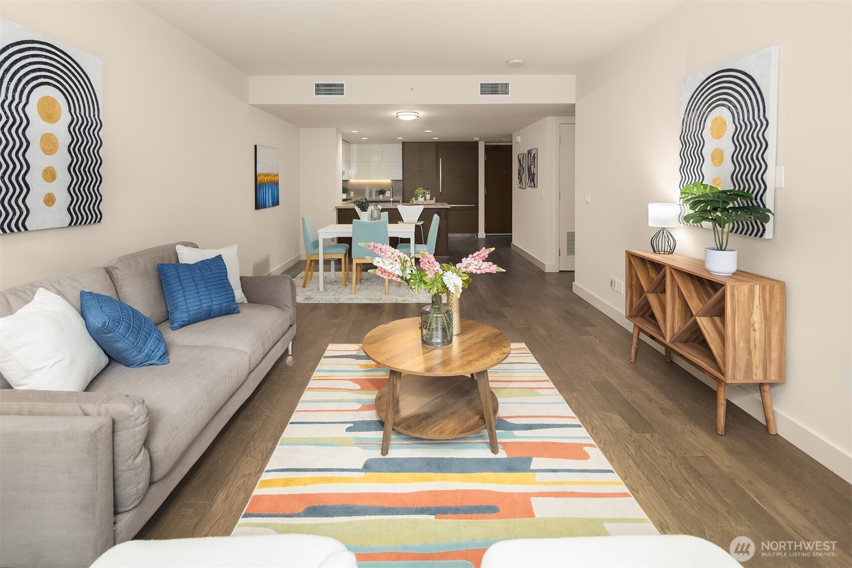 588 Bell Street, Unit 214S Seattle, WA 98121 - Photo 13 of 40 a living room with furniture fireplace and wooden floor