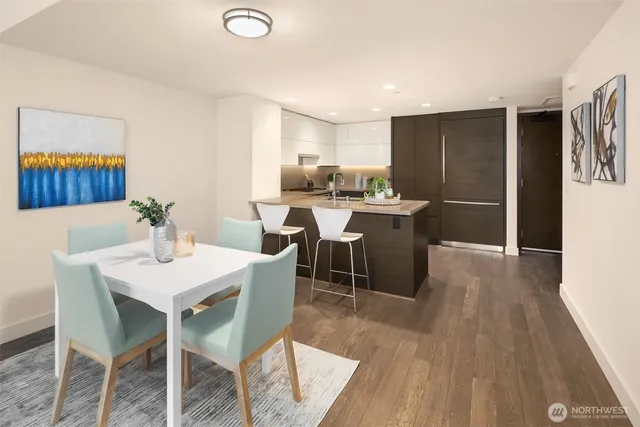 a kitchen with a sink a stove and cabinets