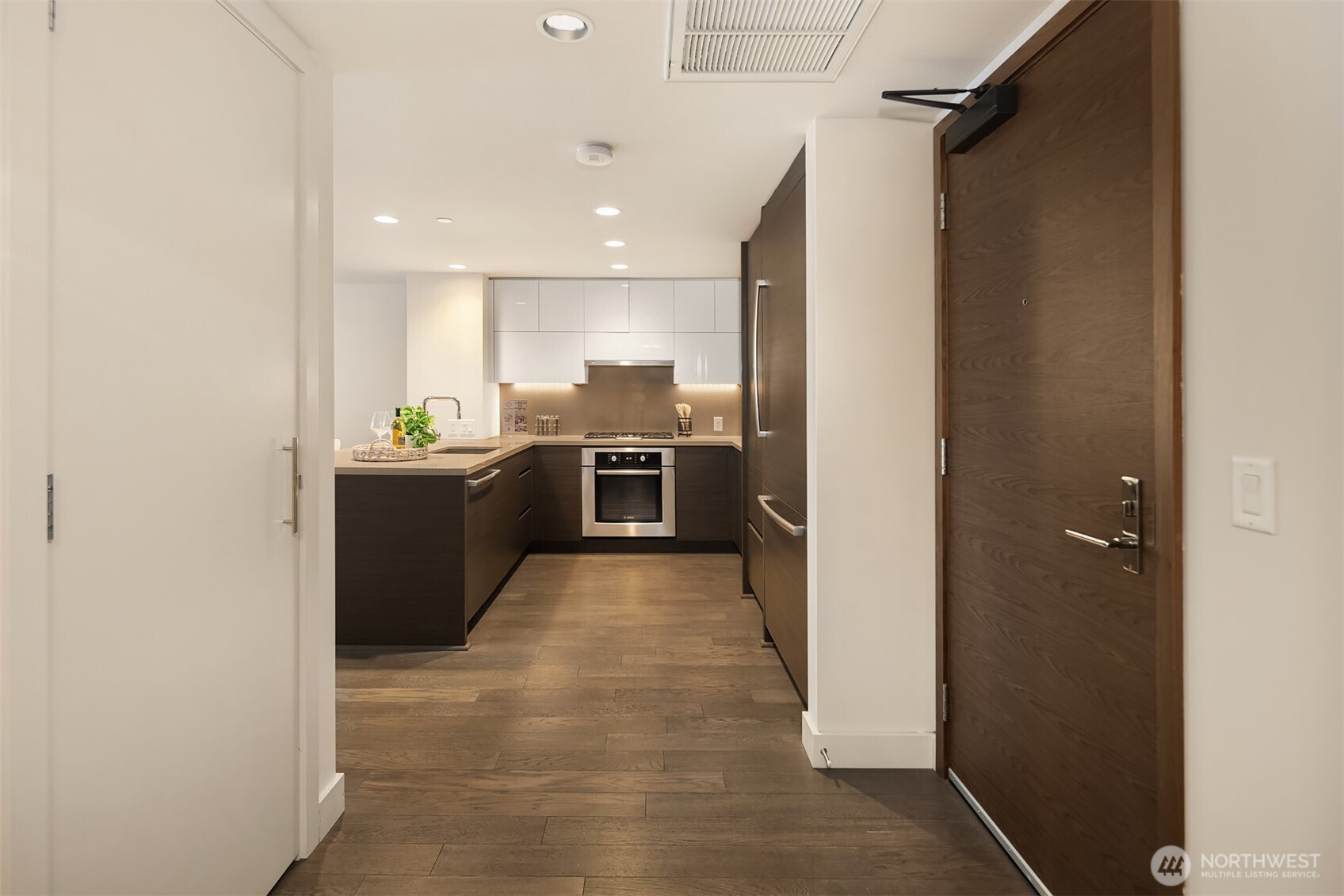 588 Bell Street, Unit 214S Seattle, WA 98121 - Photo 4 of 40 a view of a kitchen with a sink