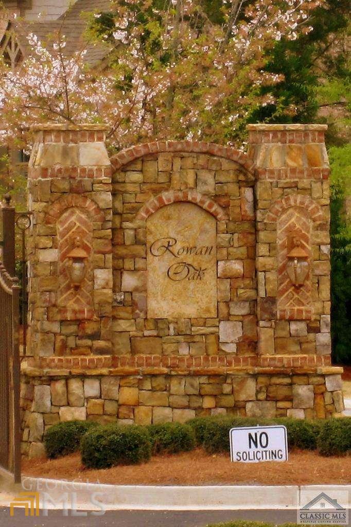 1120 Rowan Oak Circle Watkinsville, GA 30677 - Photo 1 of 1 a view of a brick wall
