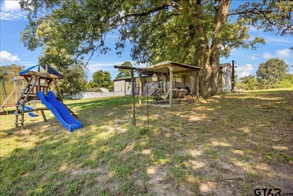 a view of a park with slide