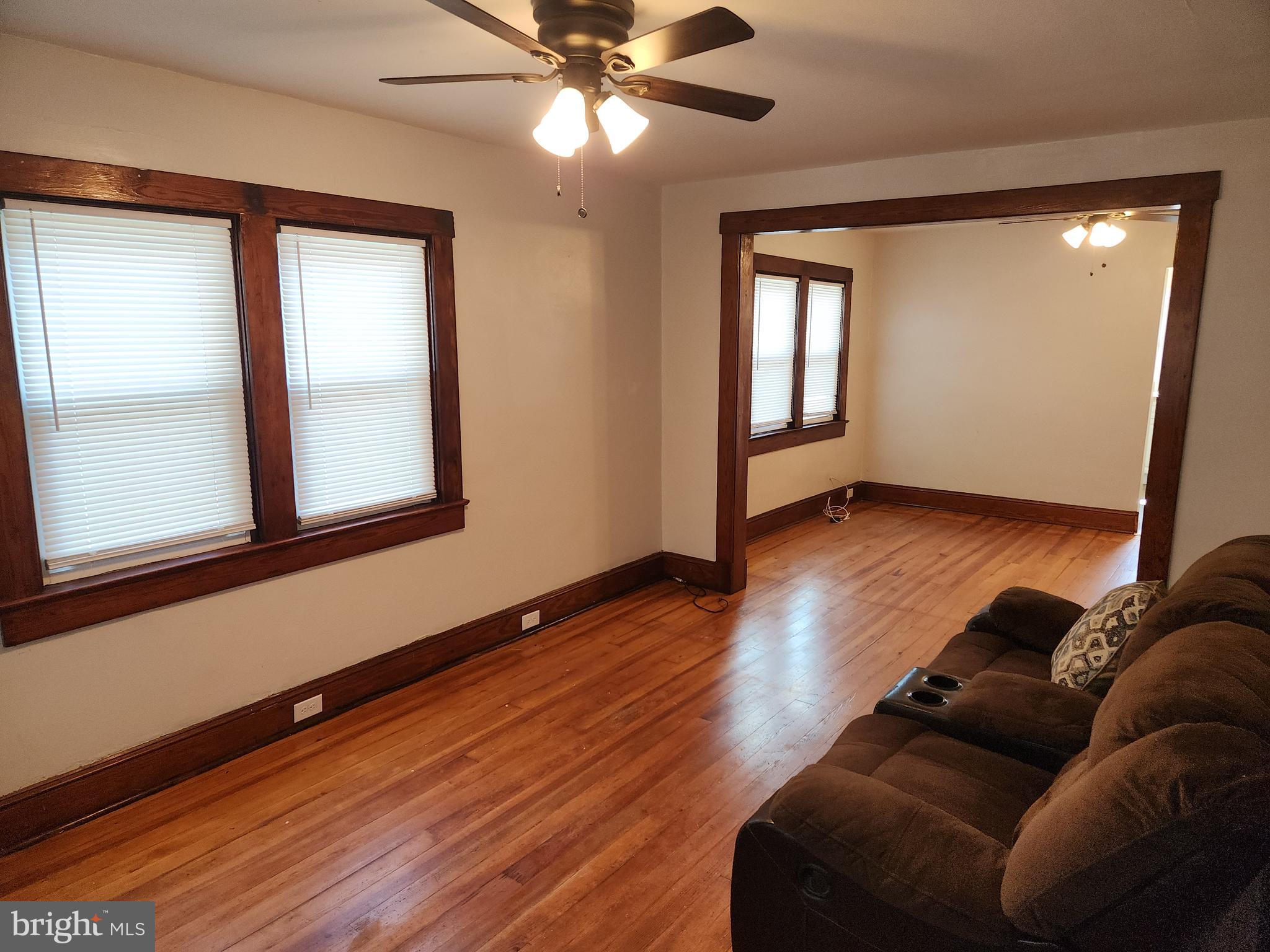 714-716 Revolution Street Havre de Grace, MD 21078 - Photo 15 of 16 a living room with furniture and wooden floor