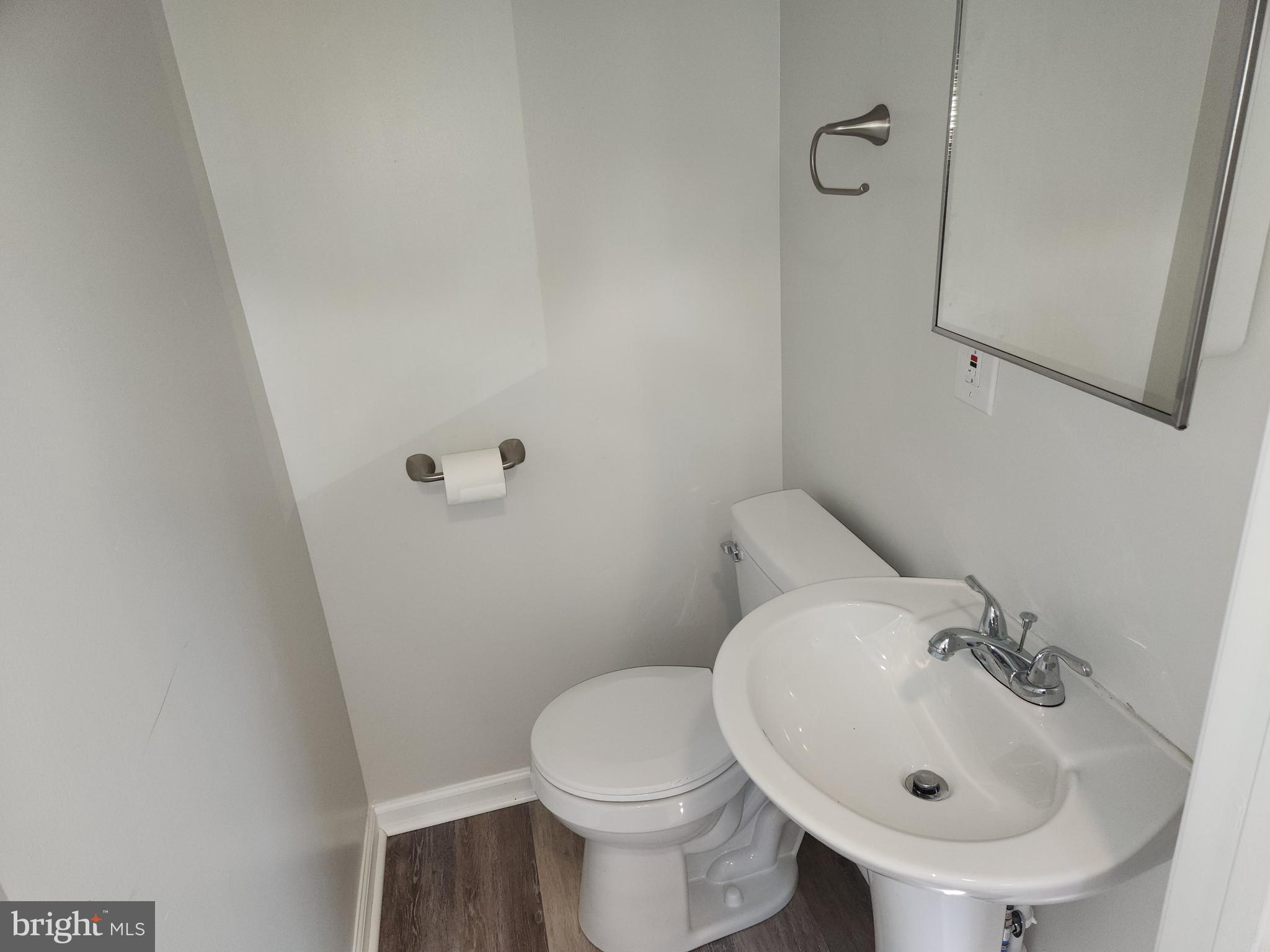 714-716 Revolution Street Havre de Grace, MD 21078 - Photo 6 of 16 a bathroom with a sink and a toilet