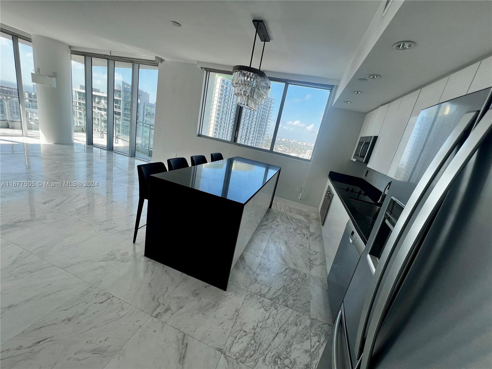 92 Southwest 3rd Street, Unit 3605 Miami, FL 33130 - Photo 11 of 24 a living room with furniture