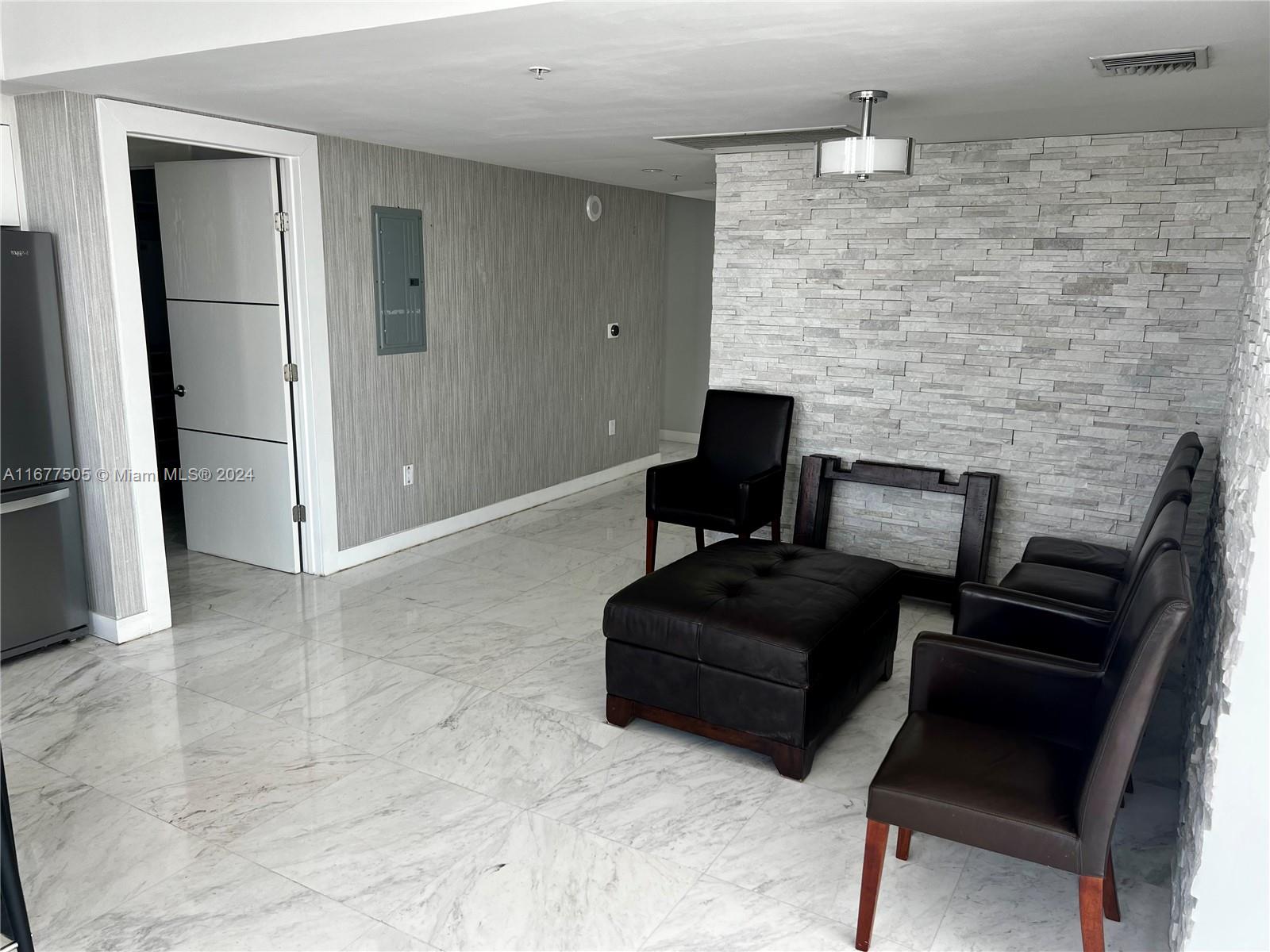 92 Southwest 3rd Street, Unit 3605 Miami, FL 33130 - Photo 13 of 24 a living room with furniture