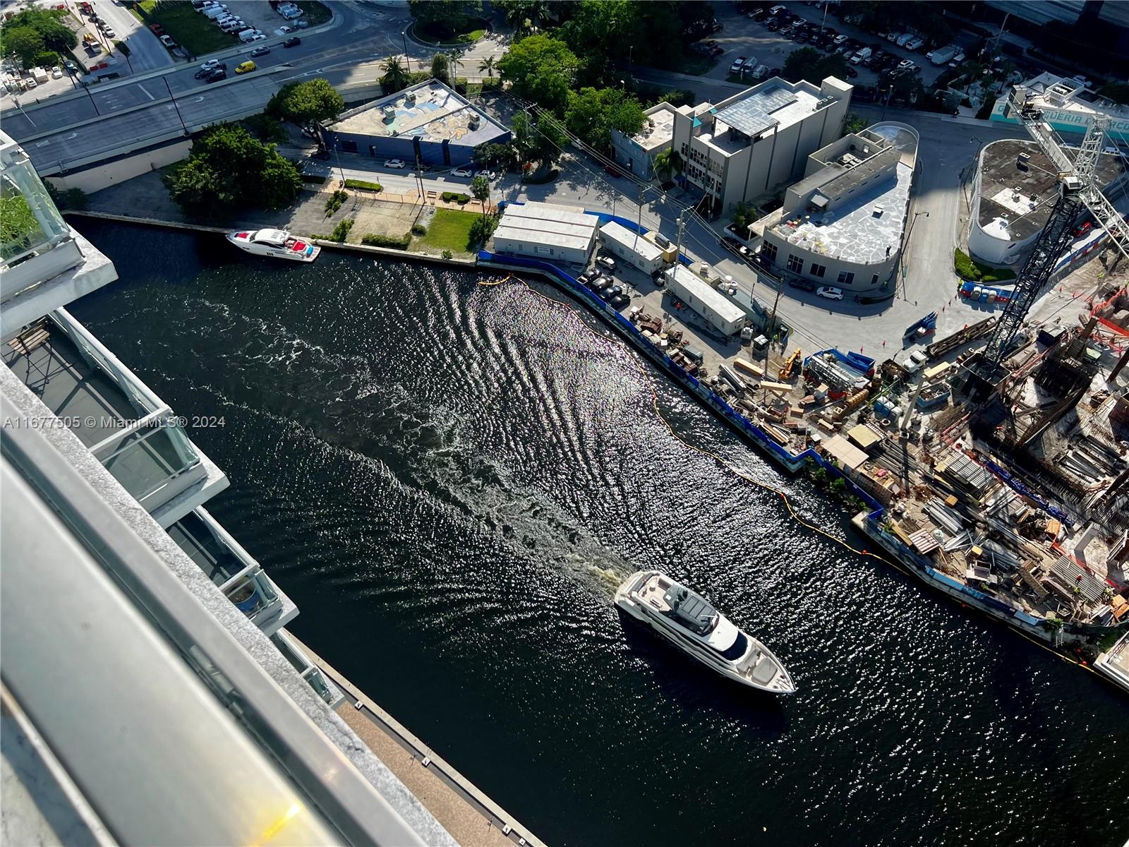 92 Southwest 3rd Street, Unit 3605 Miami, FL 33130 - Photo 2 of 24 an aerial view of multiple houses with yard