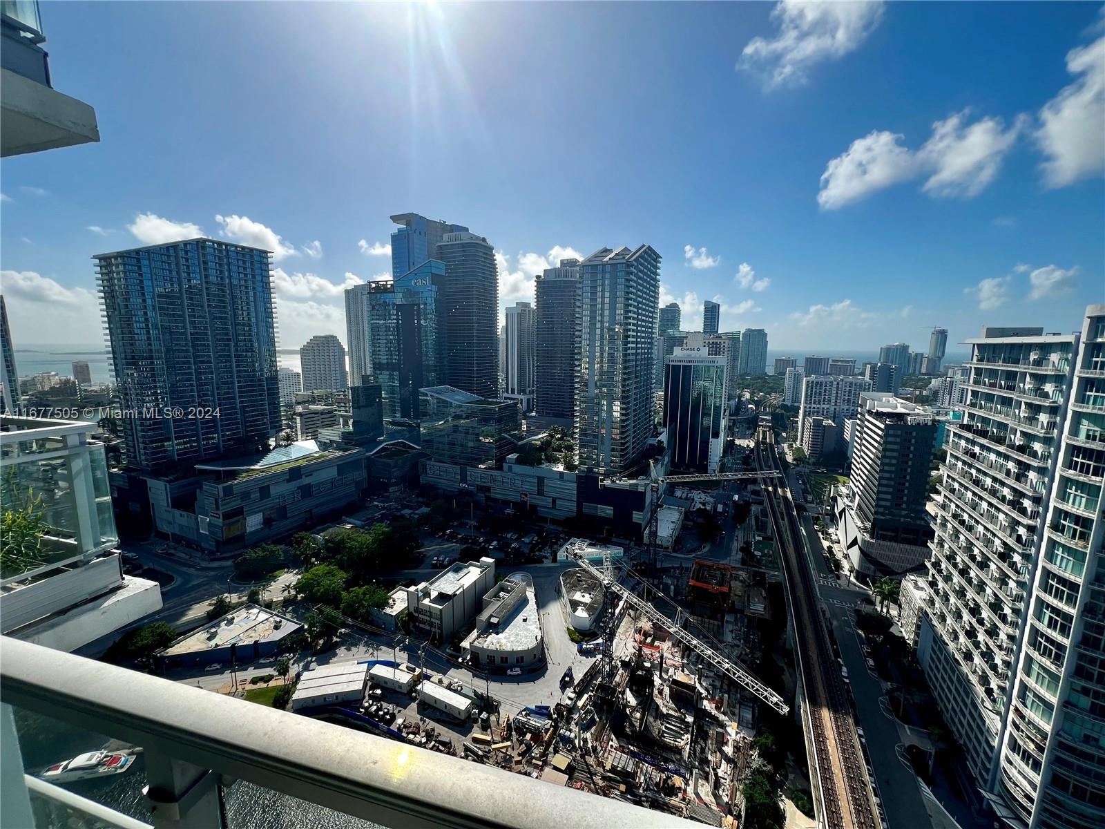 92 Southwest 3rd Street, Unit 3605 Miami, FL 33130 - Photo 6 of 24 a view of a city with tall buildings