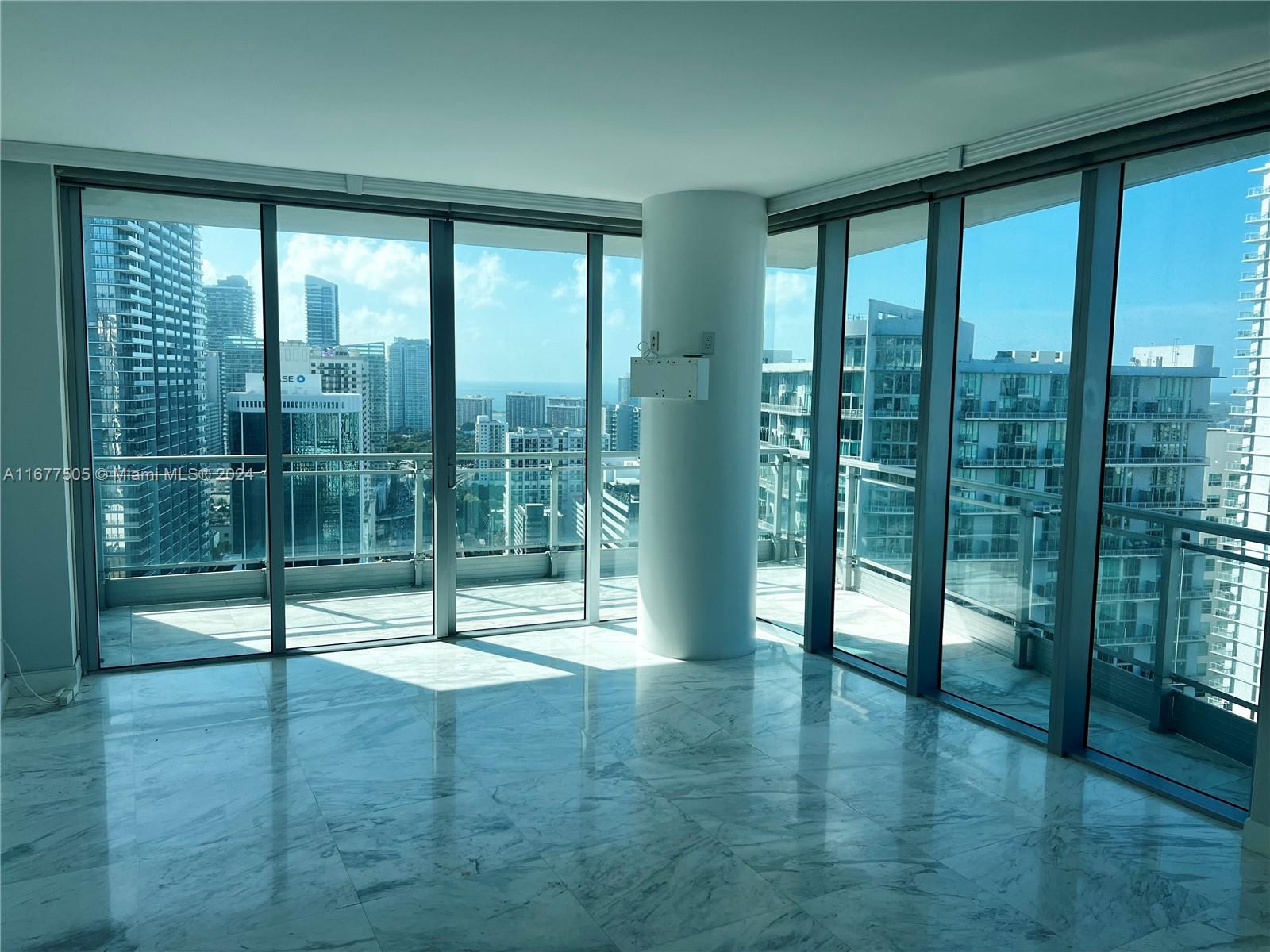 92 Southwest 3rd Street, Unit 3605 Miami, FL 33130 - Photo 7 of 24 a view of empty room with floor to ceiling window