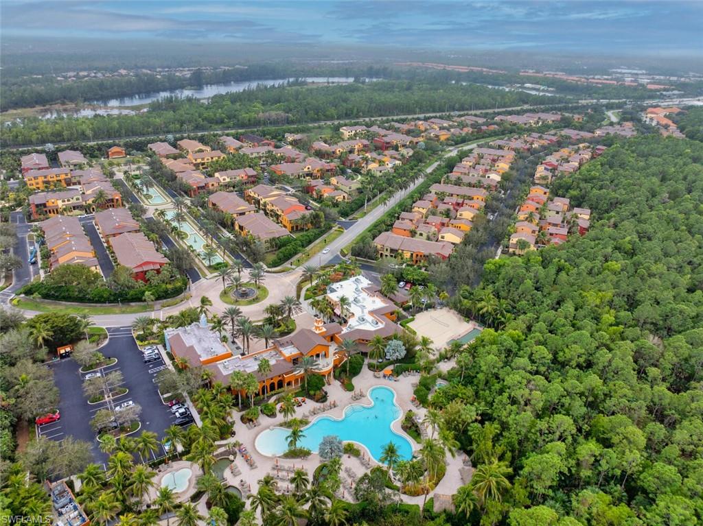 8945 Malibu Street, Unit 204 Naples, FL 34113 - Photo 18 of 21 an aerial view of residential houses with outdoor space