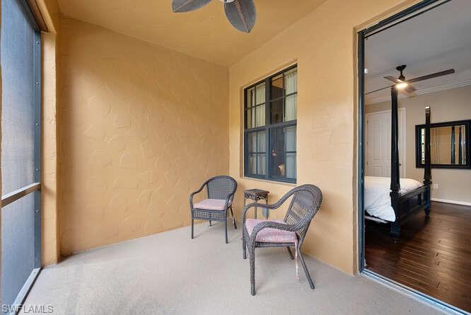 8945 Malibu Street, Unit 204 Naples, FL 34113 - Photo 9 of 21 a room with furniture and a window