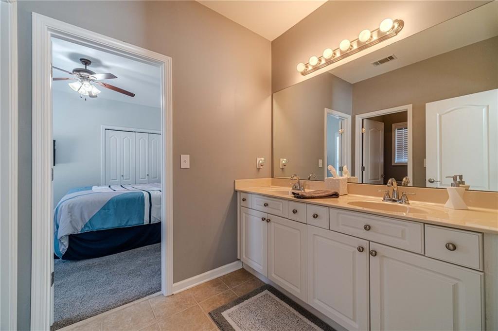 1245 White Columns Drive Monroe, GA 30656 - Photo 20 of 52 a en suite bathroom with a double vanity sink and a mirror
