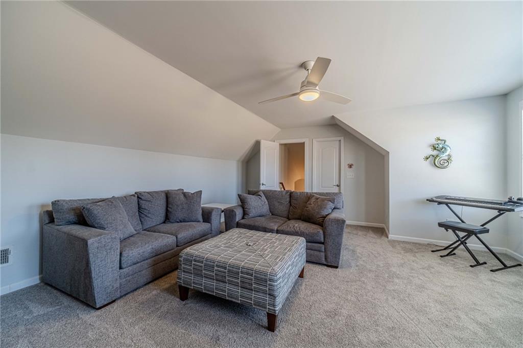 1245 White Columns Drive Monroe, GA 30656 - Photo 35 of 52 a living room with furniture and a window