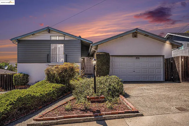 a front view of house with yard