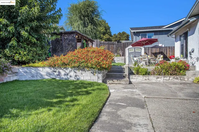 a view of swimming pool with a patio
