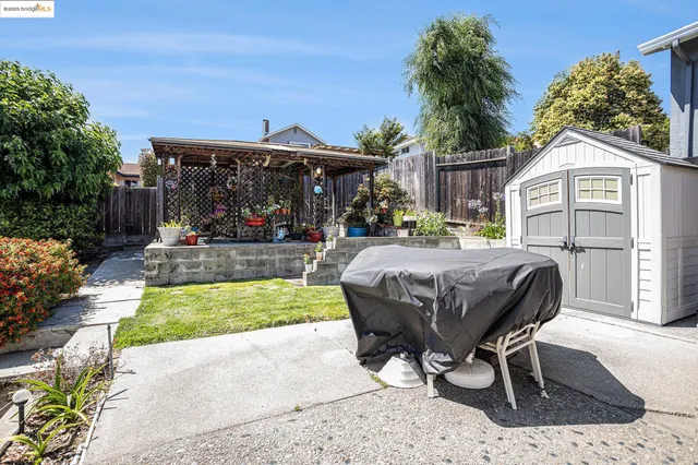 an aerial view of multiple houses with outdoor space
