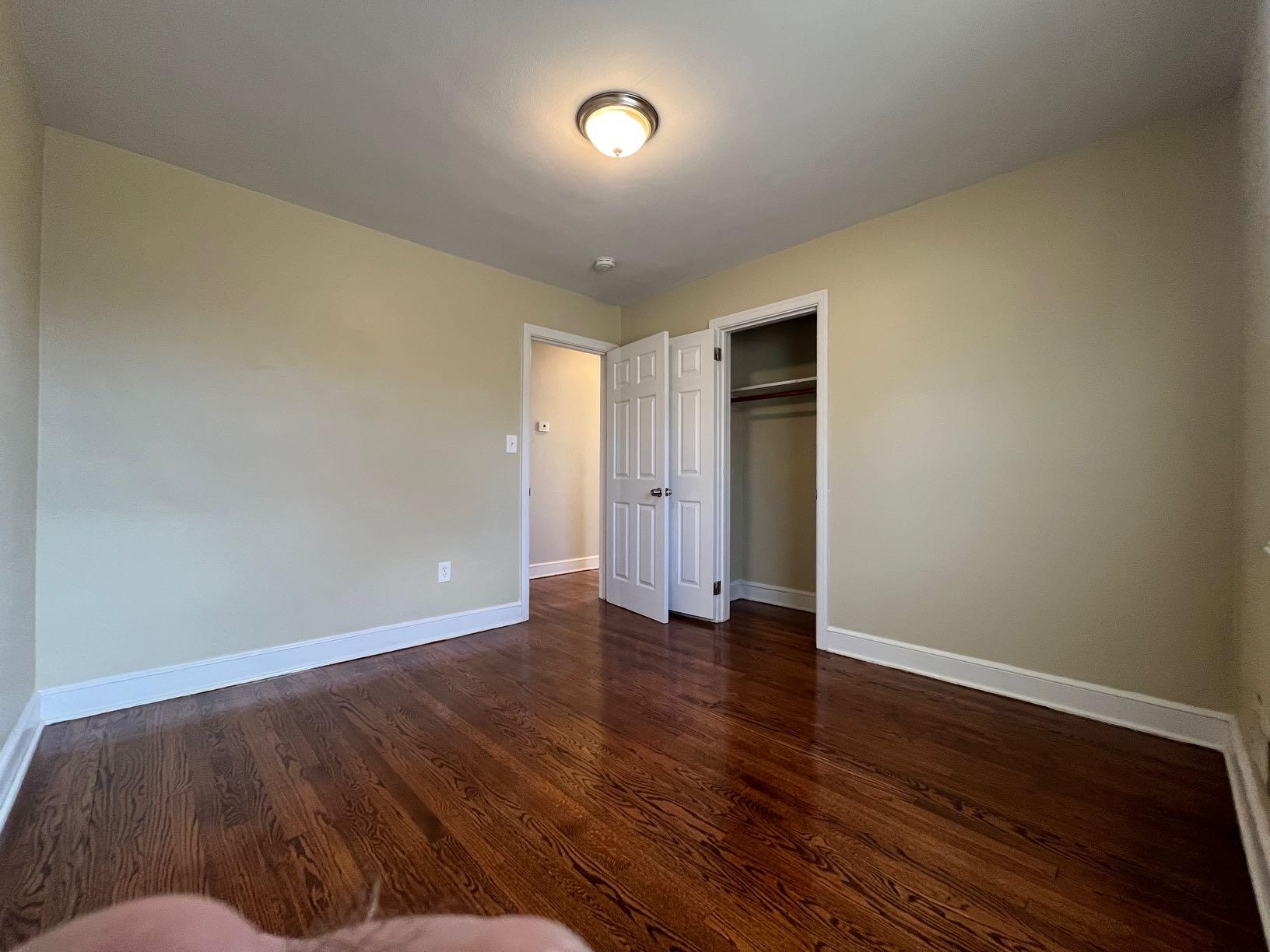 1939 Barrington Drive Northwest Roanoke, VA 24017 - Photo 8 of 14 a view of an empty room with wooden floor
