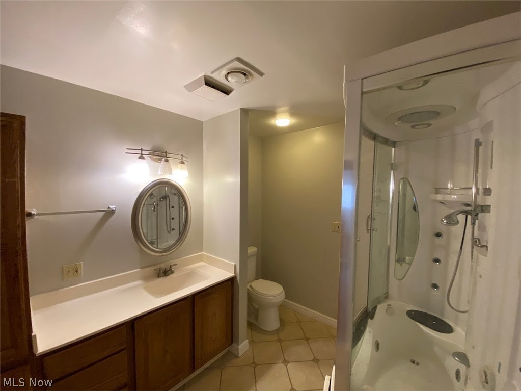 1027 Learidge Road Cleveland, OH 44124 - Photo 11 of 19 Large Master Bathroom with Jacuzzi tub and Custom Jetted Shower