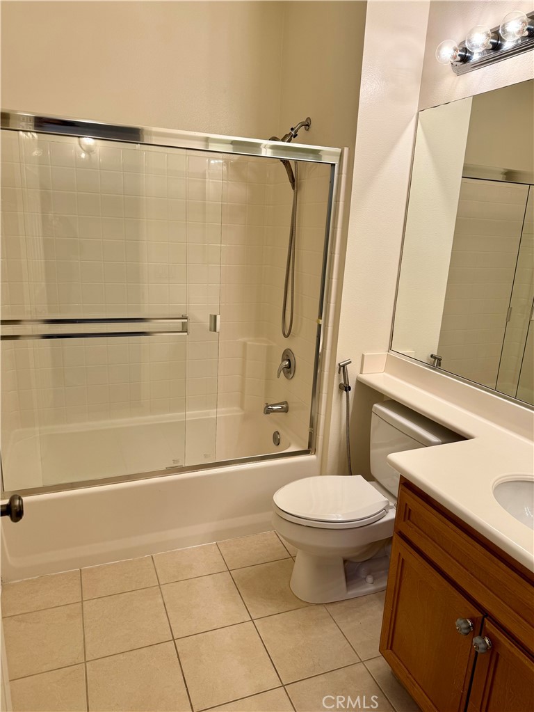 238 Coral Rose Irvine, CA 92603 - Photo 11 of 19 a bathroom with a toilet and a shower