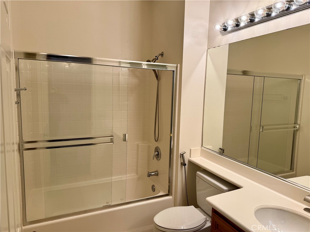 238 Coral Rose Irvine, CA 92603 - Photo 12 of 19 a bathroom with a sink toilet and shower