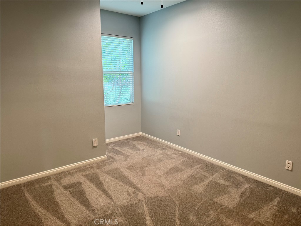 238 Coral Rose Irvine, CA 92603 - Photo 13 of 19 a view of an empty room with a window