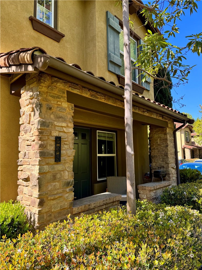 238 Coral Rose Irvine, CA 92603 - Photo 17 of 19 front view of a house with a window