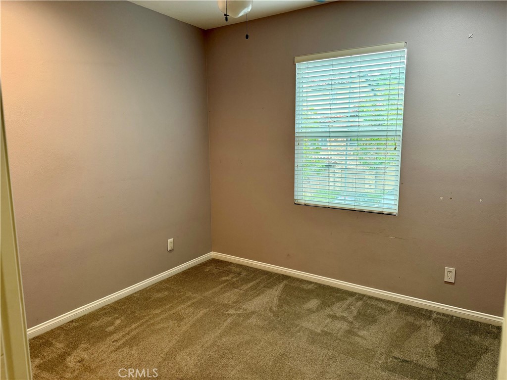238 Coral Rose Irvine, CA 92603 - Photo 10 of 19 a view of an empty room with a window