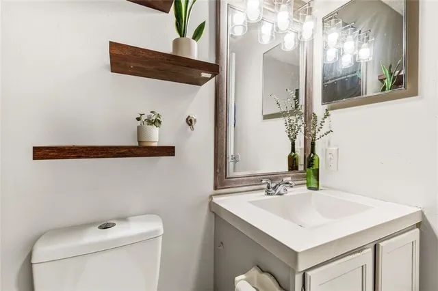 a bathroom with a sink and a toilet