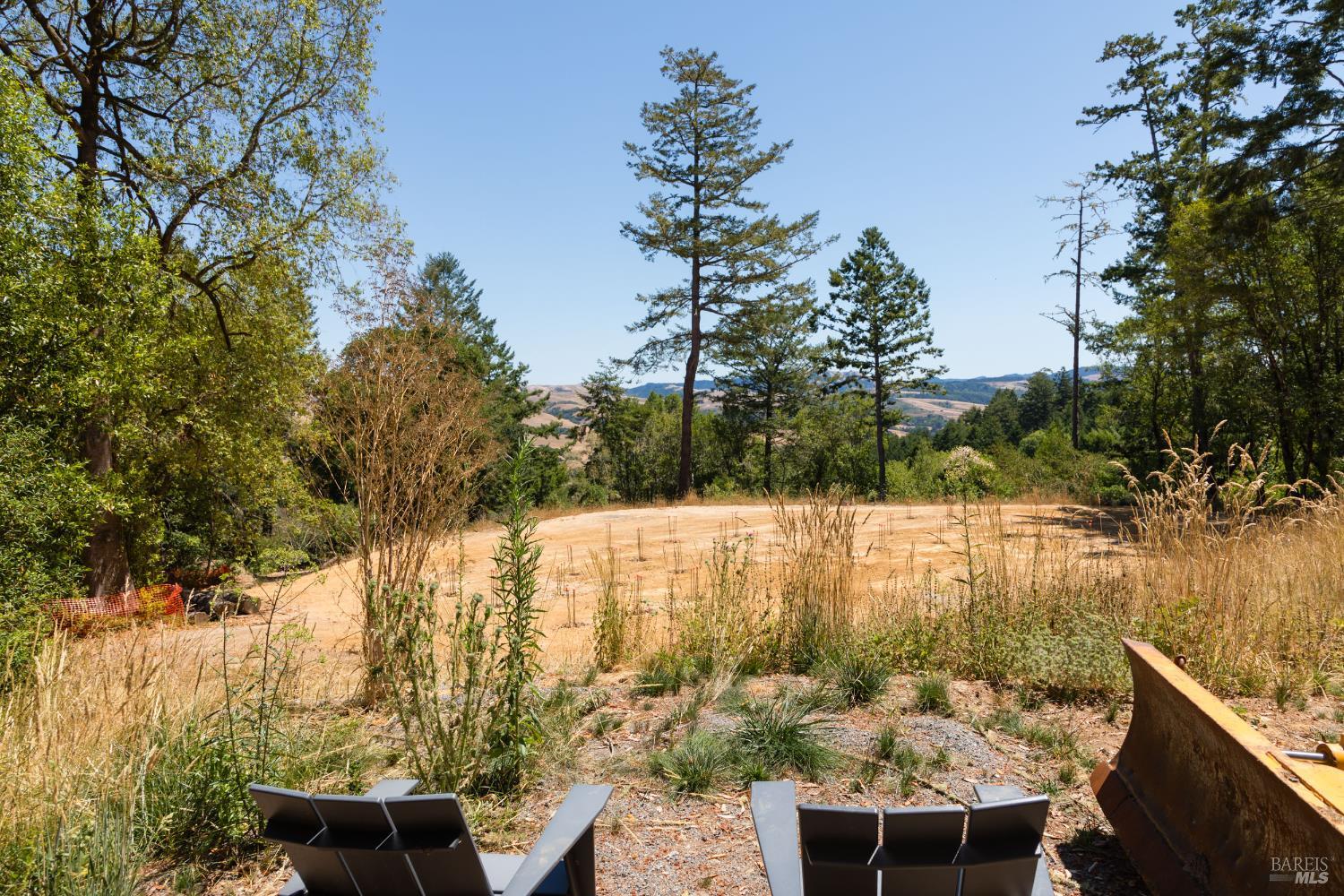 70 Fox Drive Point Reyes Station, CA 94956 - Photo 17 of 34 a view of a lake with furniture