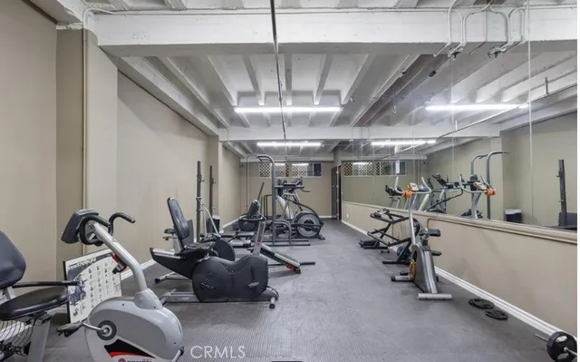 a view of a city with tall buildings and a big yard