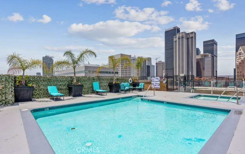 312 West 5th Street, Unit 1003 Los Angeles, CA 90013 - Photo 16 of 20 a view of a city with tall buildings and a big yard
