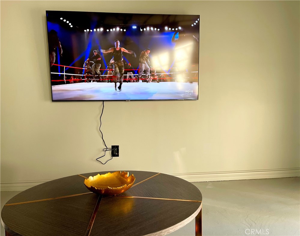 312 West 5th Street, Unit 1003 Los Angeles, CA 90013 - Photo 20 of 20 a view of a room with wooden floor