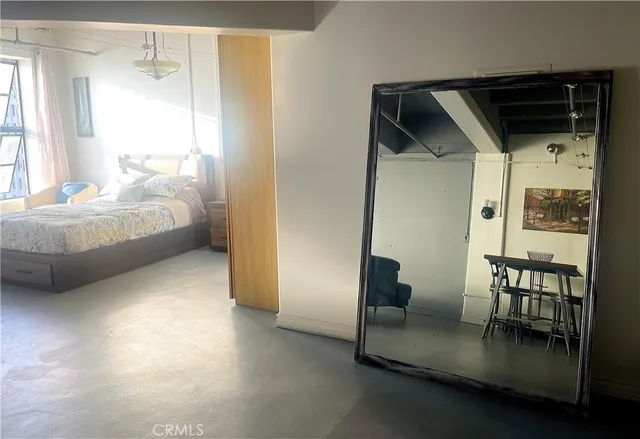 a en suite bathroom with a sink and a mirror