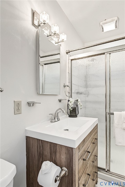 13310 Gladehill Road Chester, VA 23831 - Photo 14 of 41 Wood-finish vanity with an integrated sink, brushe