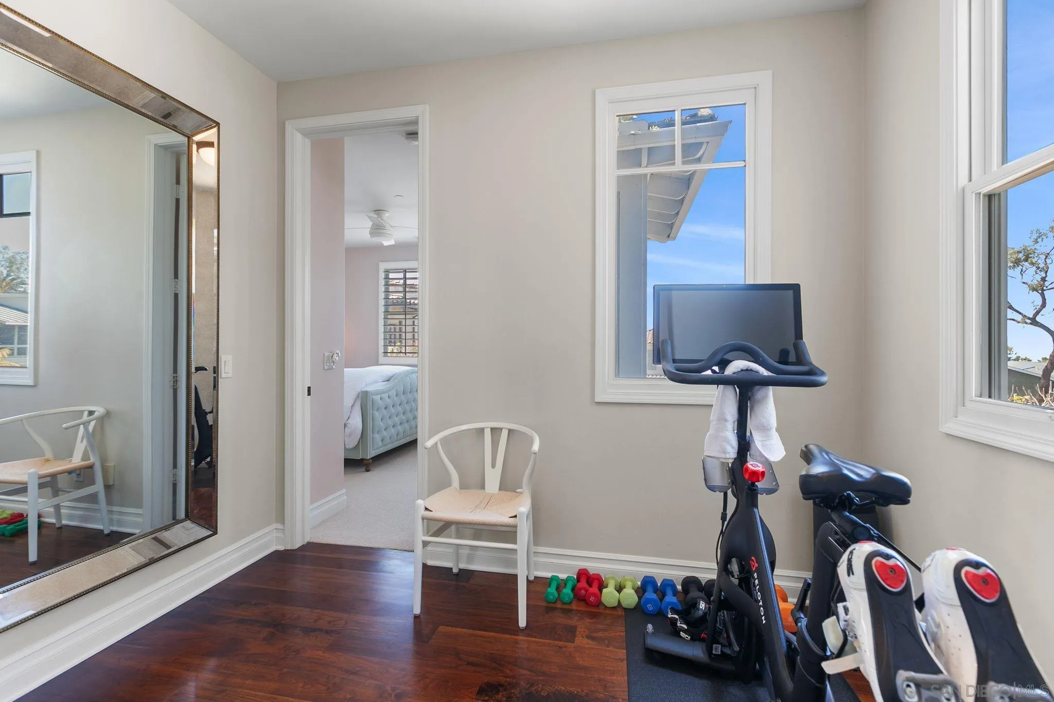 329 Chopin Way Cardiff, CA 92007 - Photo 18 of 47 a view of a livingroom with lounge chair and a window