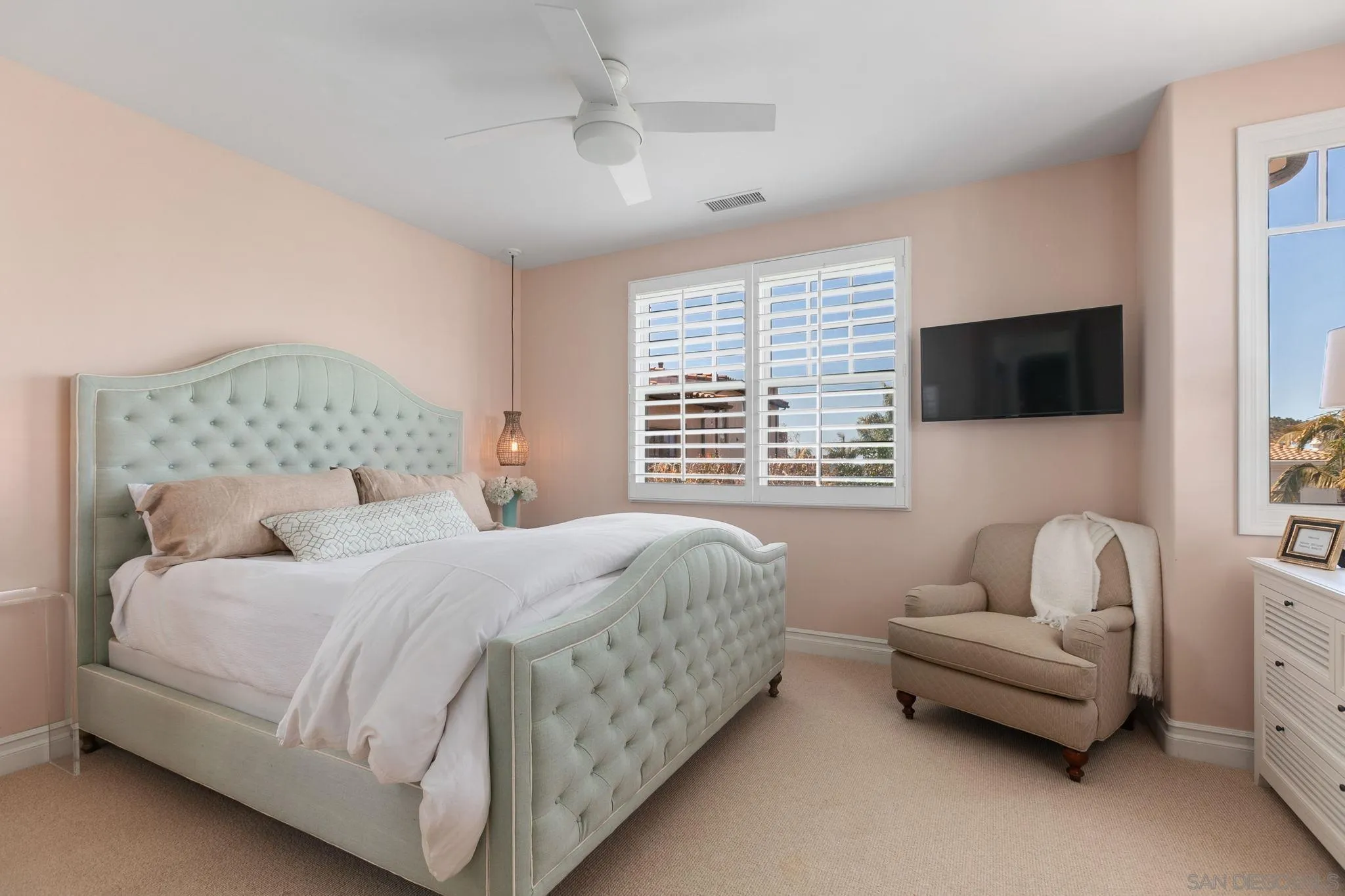 329 Chopin Way Cardiff, CA 92007 - Photo 19 of 47 a bedroom with a bed and a couch