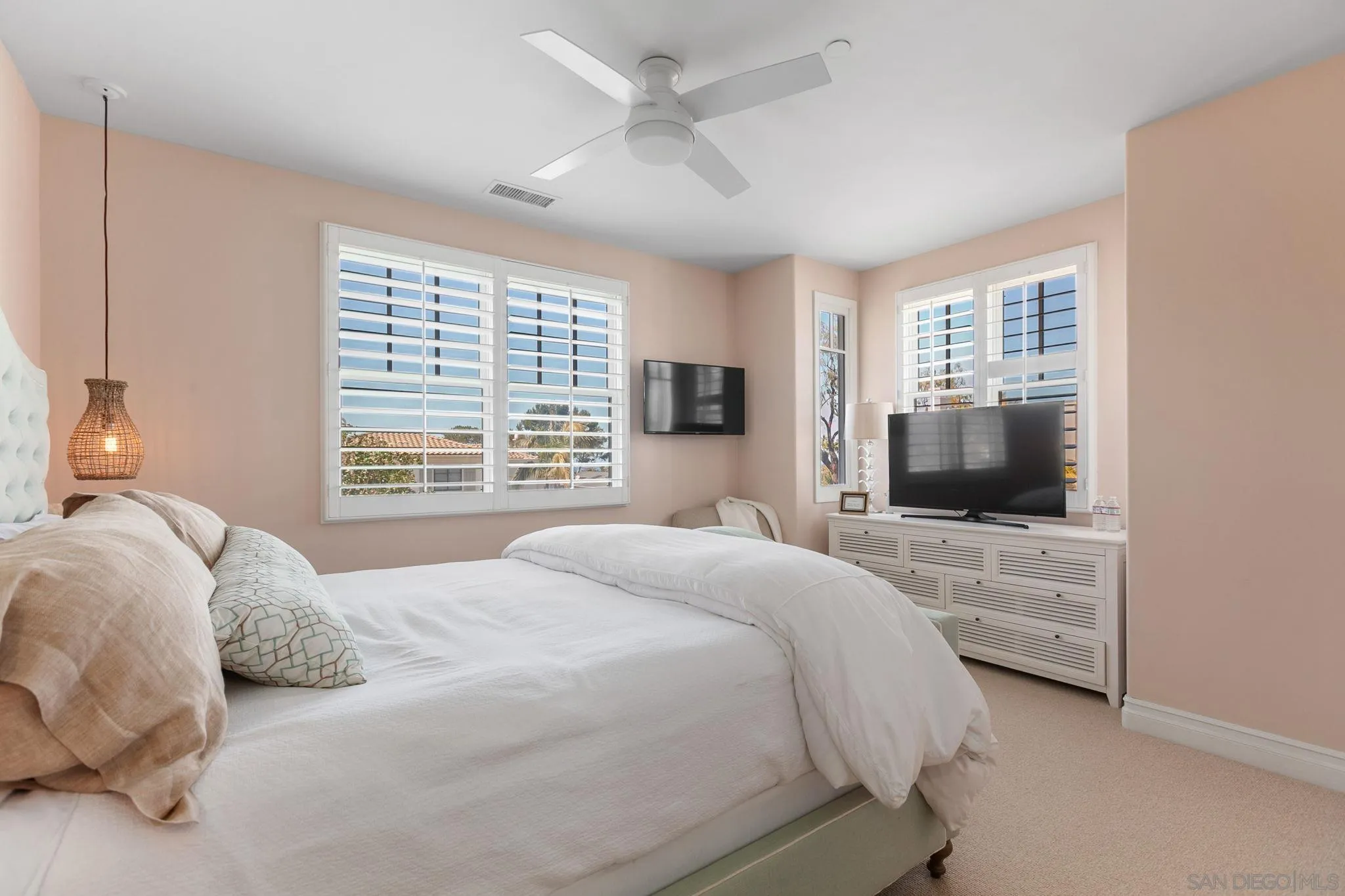 329 Chopin Way Cardiff, CA 92007 - Photo 20 of 47 a bedroom with a bed and a flat screen tv