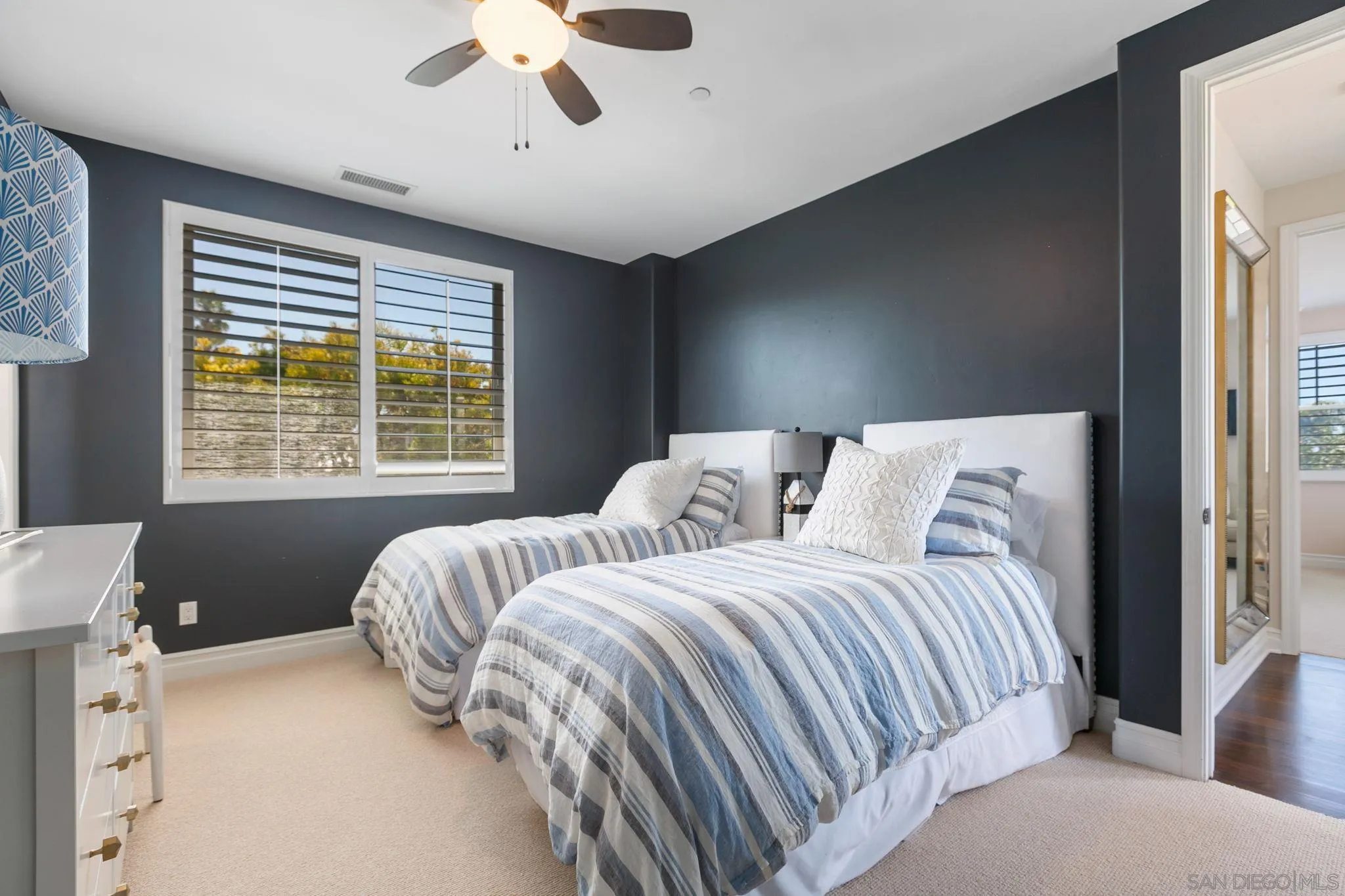 329 Chopin Way Cardiff, CA 92007 - Photo 21 of 47 a bedroom with a bed and a window