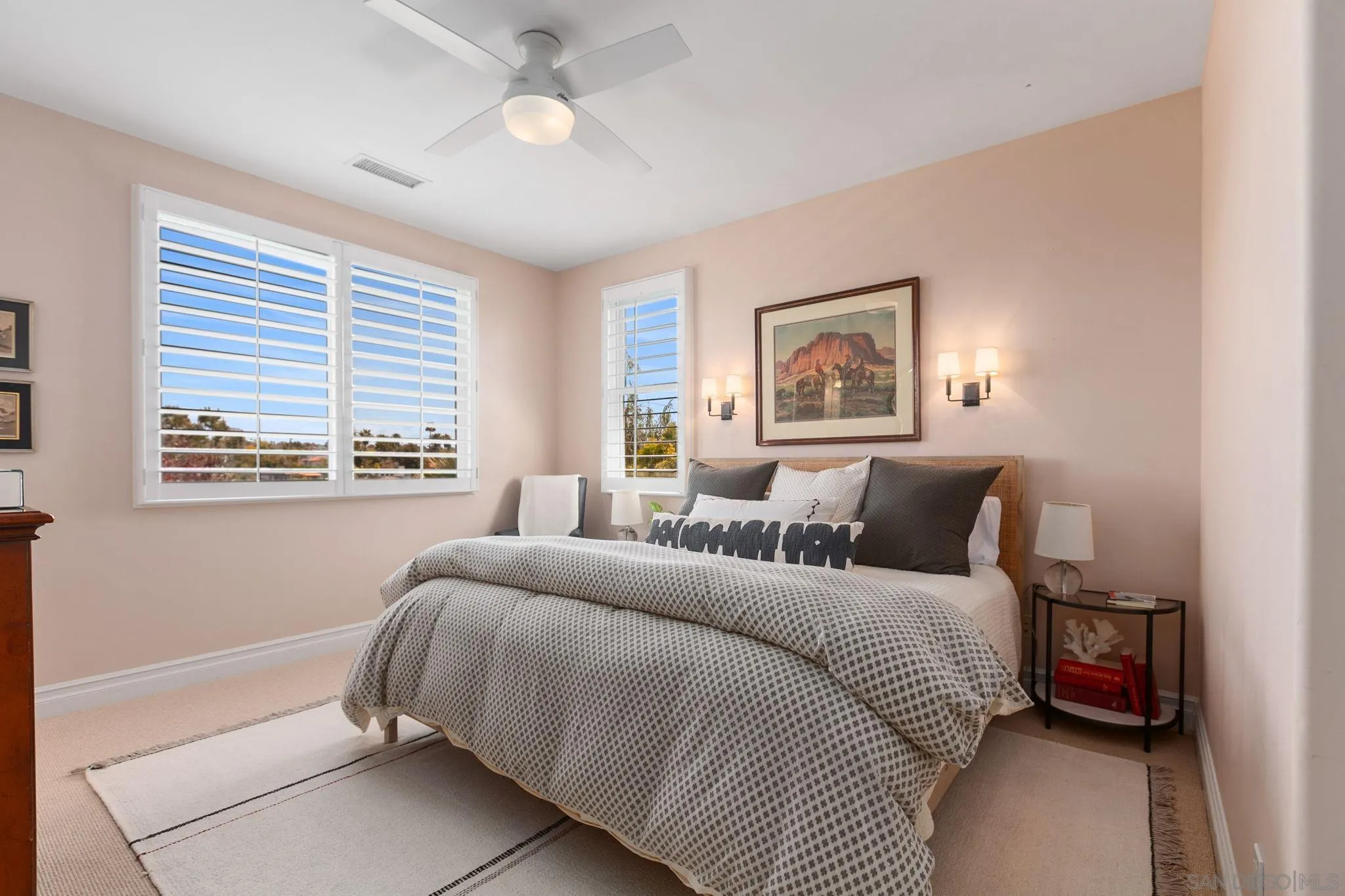 329 Chopin Way Cardiff, CA 92007 - Photo 24 of 47 a bedroom with a large bed and a window
