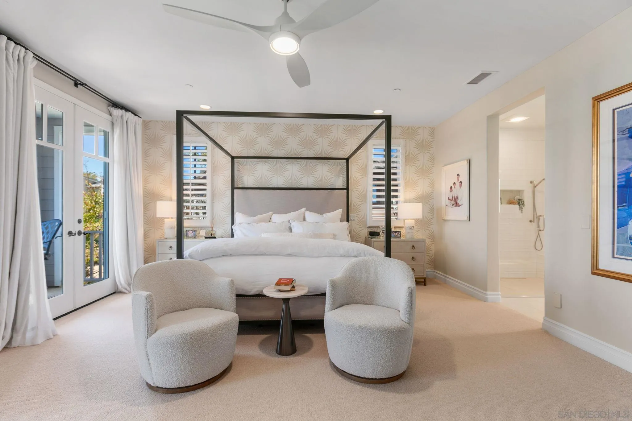 329 Chopin Way Cardiff, CA 92007 - Photo 27 of 47 a bedroom with a bed and a chandelier