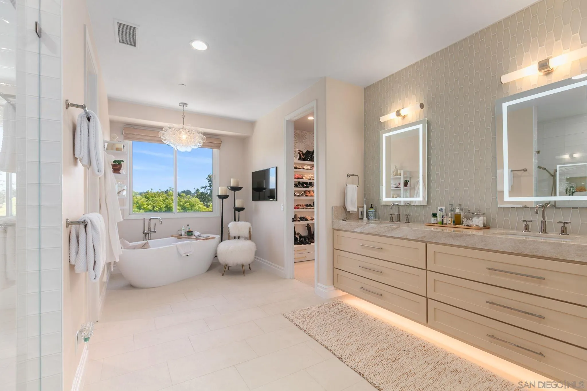 329 Chopin Way Cardiff, CA 92007 - Photo 28 of 47 a bathroom with a granite countertop sink and mirror