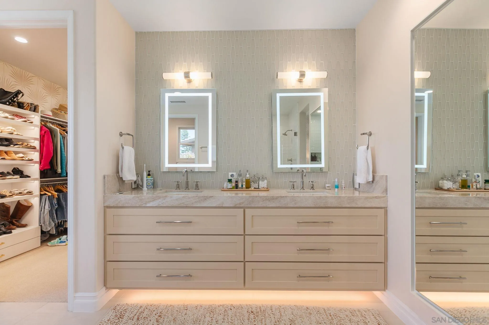 329 Chopin Way Cardiff, CA 92007 - Photo 29 of 47 a bathroom with a sink and a mirror