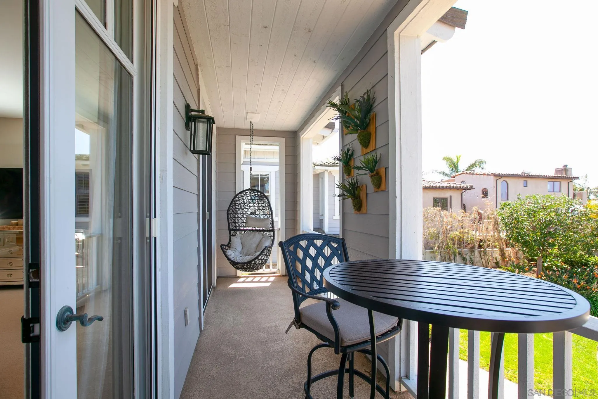 329 Chopin Way Cardiff, CA 92007 - Photo 32 of 47 a view of a patio with table and chairs