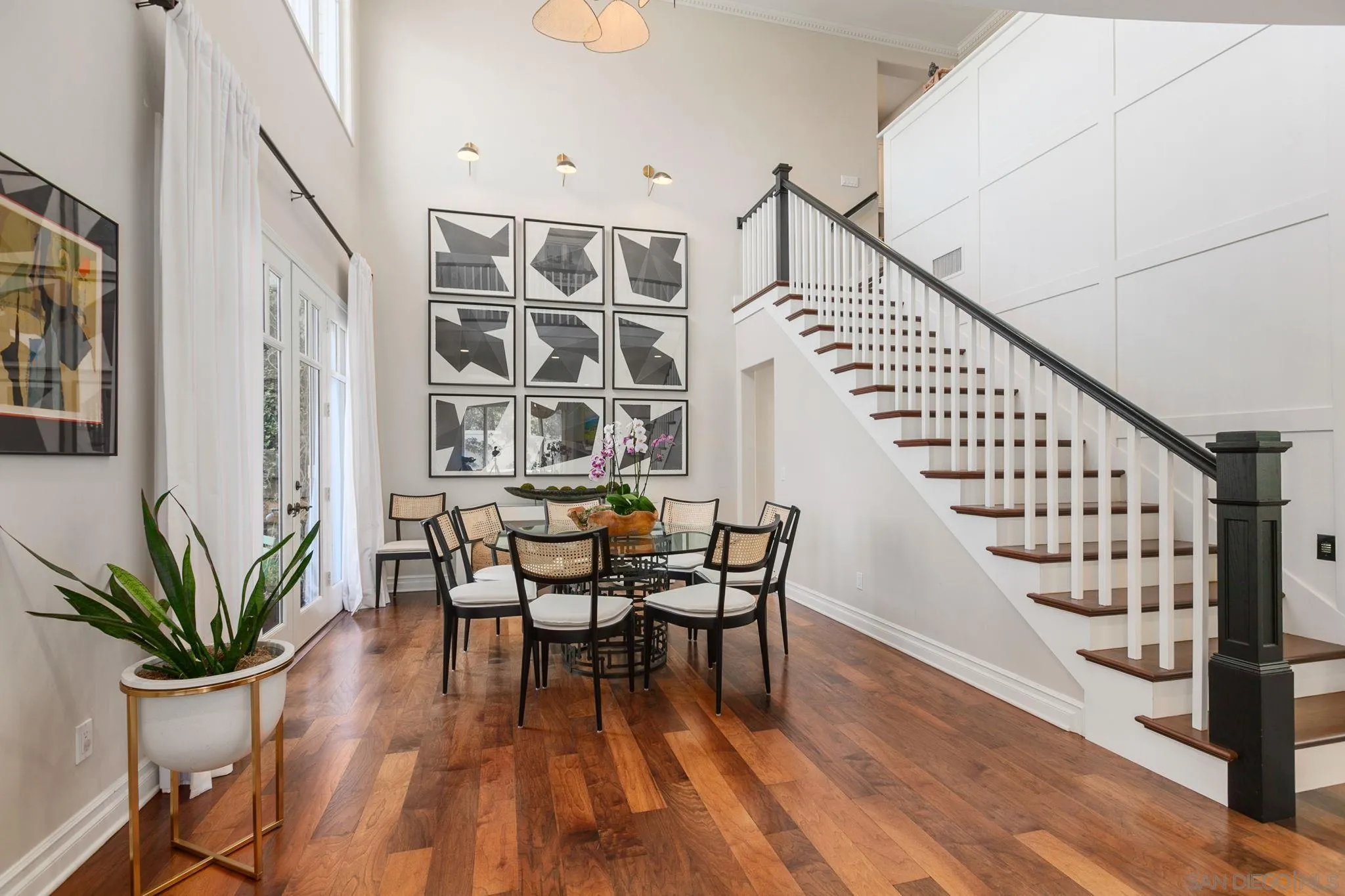 329 Chopin Way Cardiff, CA 92007 - Photo 5 of 47 a view of a dining room with furniture and wooden floor