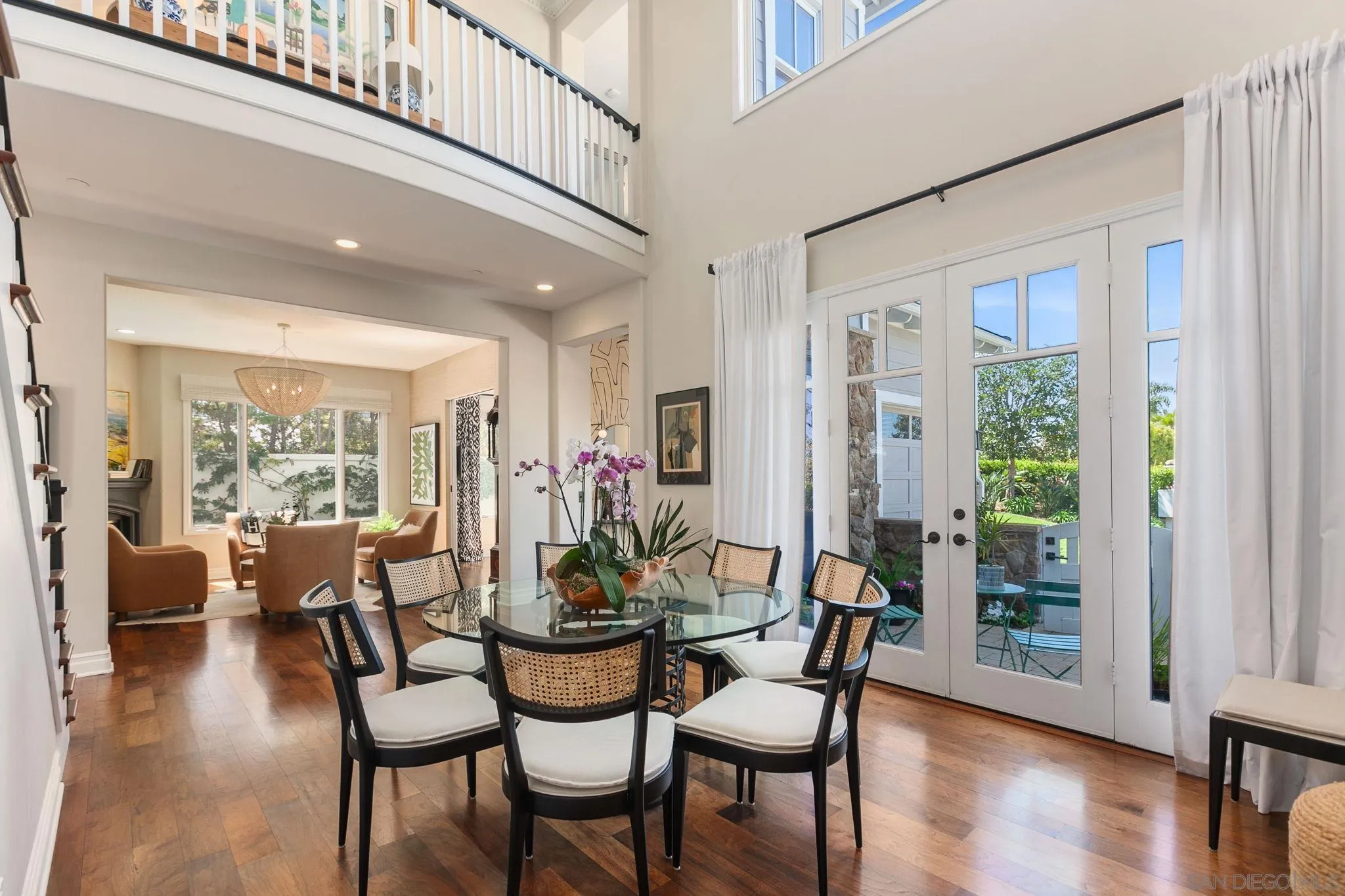 329 Chopin Way Cardiff, CA 92007 - Photo 6 of 47 a dining room with furniture window and wooden floor