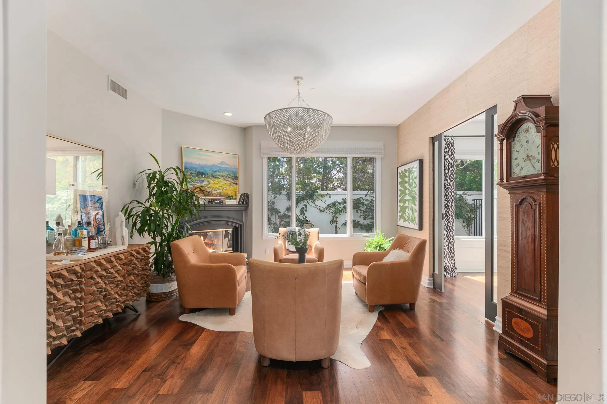 329 Chopin Way Cardiff, CA 92007 - Photo 7 of 47 a living room with furniture a window and a chandelier