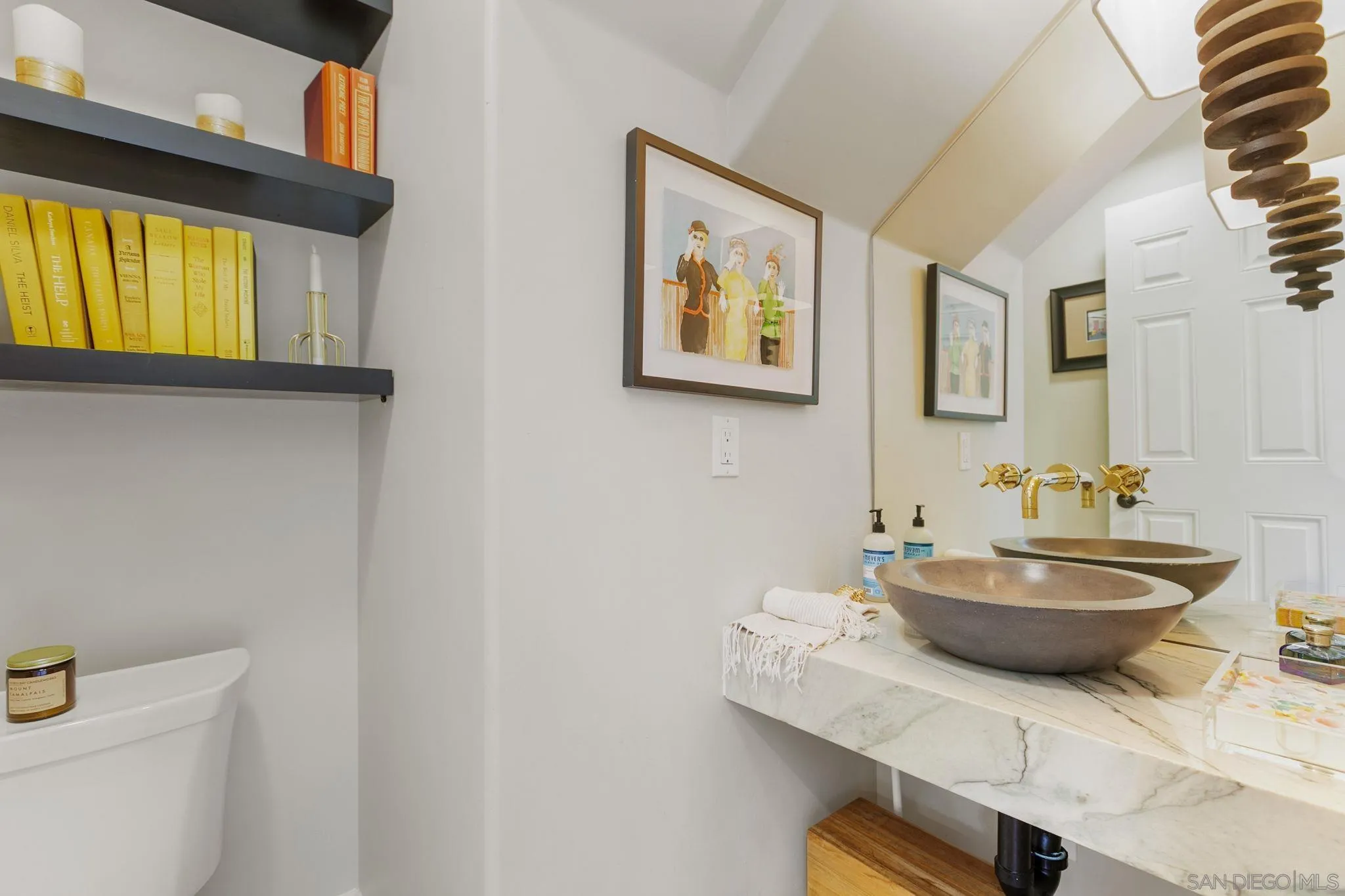 329 Chopin Way Cardiff, CA 92007 - Photo 10 of 47 a bathroom with a sink and a mirror