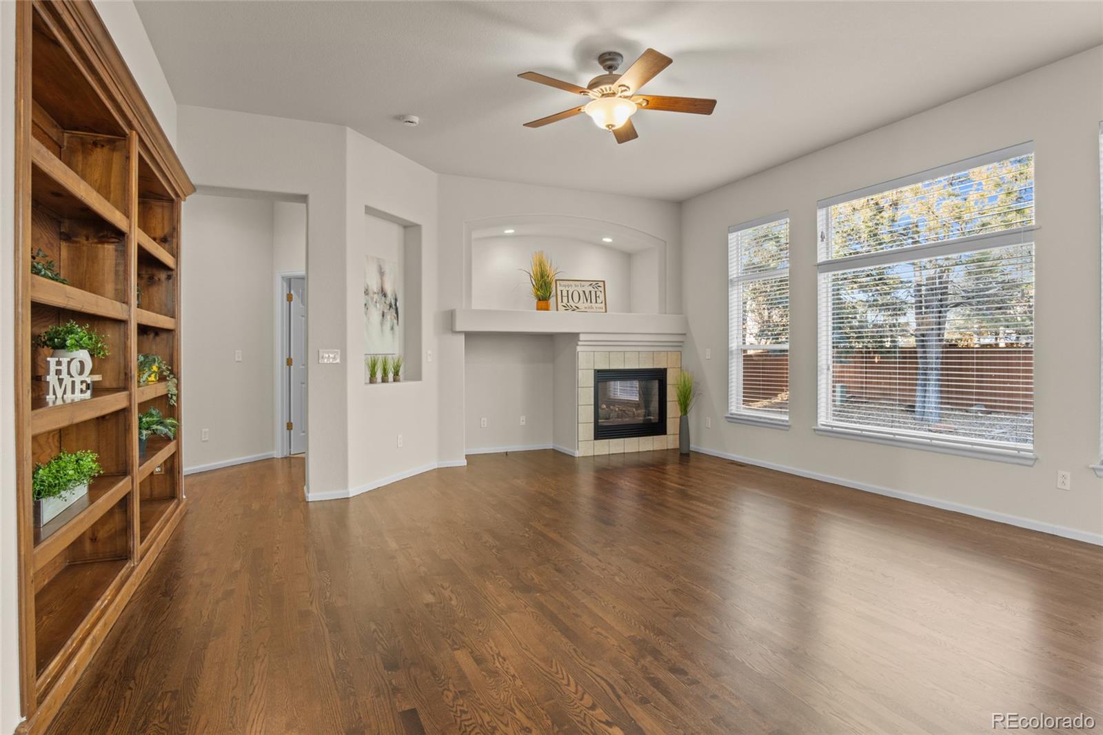 20800 Omaha Avenue Parker, CO 80138 - Photo 12 of 38 wooden floor in an empty room with a window