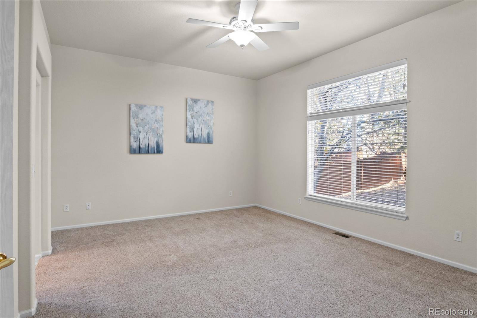 20800 Omaha Avenue Parker, CO 80138 - Photo 14 of 38 a view of an empty room with a window